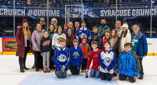 Caz Students, Families & Faculty Participate in French Night at Syracuse Crunch