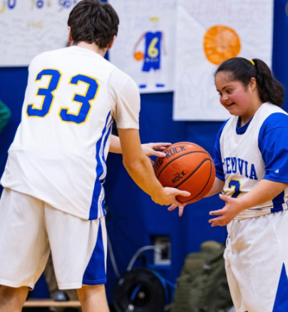 students playing basketball
